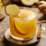 Apple cider vinegar detox drink on rustic kitchen counter