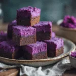 Beautifully arranged Purple Sweet Potato Brownies on a ceramic plate